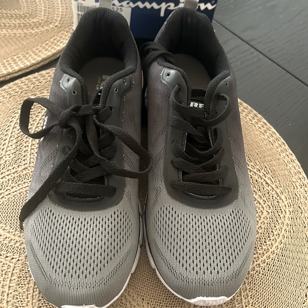 Champions women’s tennis shoe.